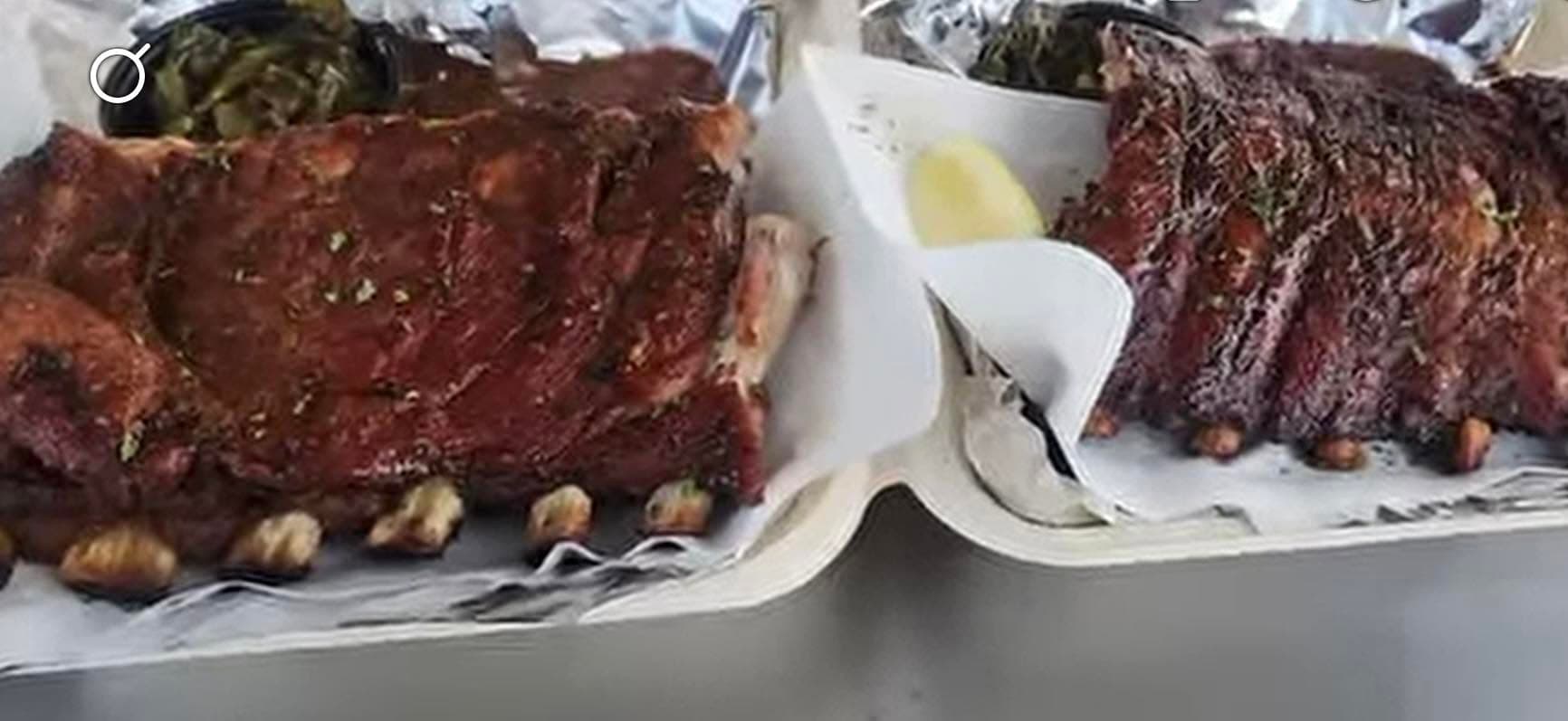 Grilled steaks with butter on white plates